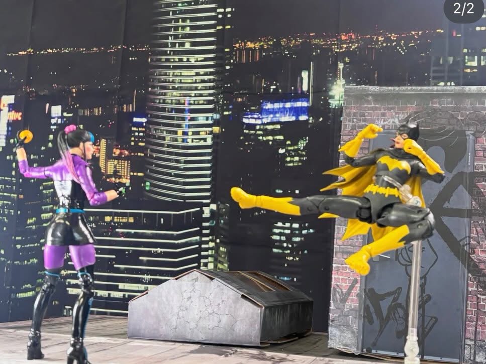 Finished figure photo of a rooftop duel against a night city skyline